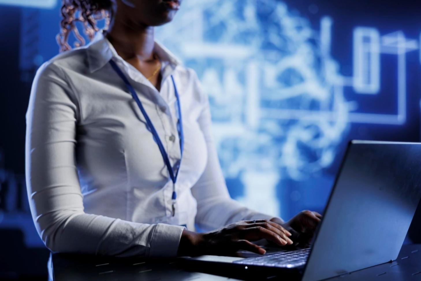 Instructor demonstrating network security concepts on computer